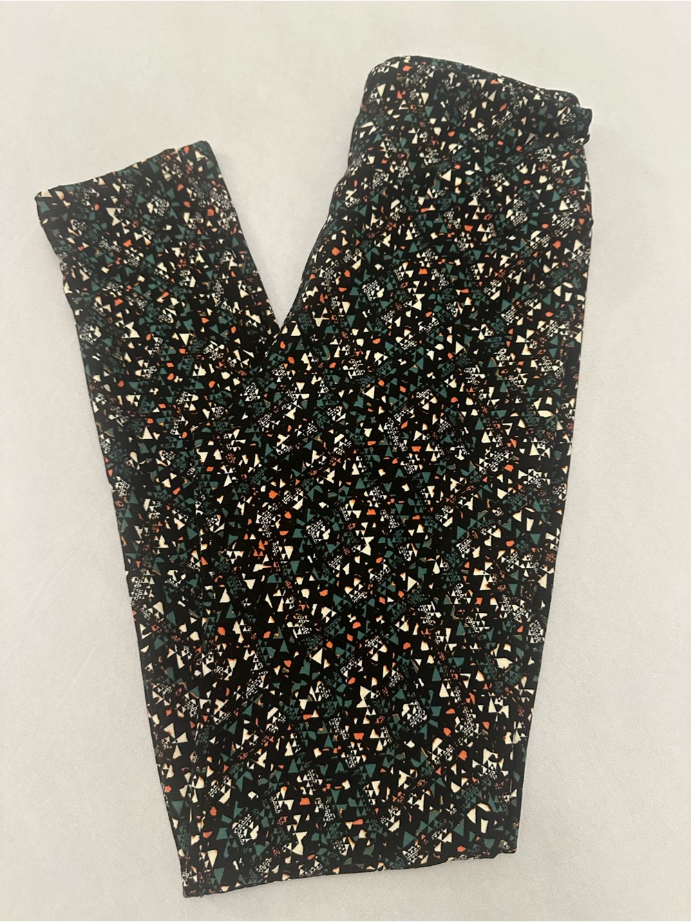LuLaRoe Black Geometric Pattern Leggings with Teal and Cream Accents
